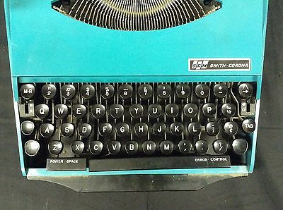 smith-corona-super-g-vintage-typewriter-381736go-91dfc0acee5ad1bb2cf72536b21dcfea.jpg